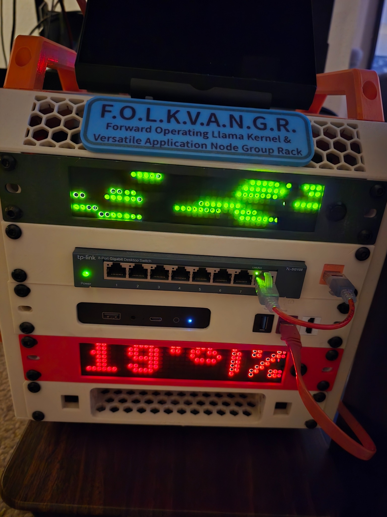 Compact rack with green RackBeacon-style display installed